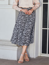 Load image into Gallery viewer, Animal Print Pleated Midi Skirt