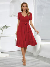 Load image into Gallery viewer, Smocked Tie Front Short Sleeve Tiered Dress
