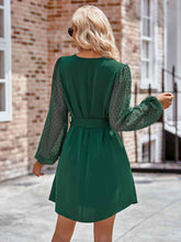 Load image into Gallery viewer, Tied Swiss Dot Long Sleeve Mini Dress
