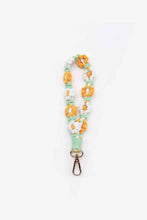 Load image into Gallery viewer, Assorted 4-Piece Macrame Flower Keychain
