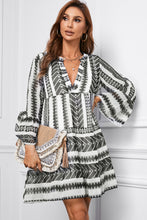 Load image into Gallery viewer, Printed Notched Neck Flare Sleeve Tiered Dress
