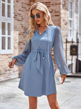 Load image into Gallery viewer, Tied Swiss Dot Long Sleeve Mini Dress
