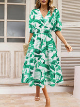 Load image into Gallery viewer, Ruched Printed Surplice Short Sleeve Dress
