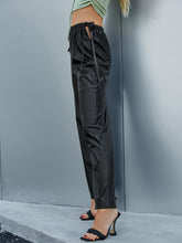 Load image into Gallery viewer, Side Tie Cutout PU Leather Flare Pants
